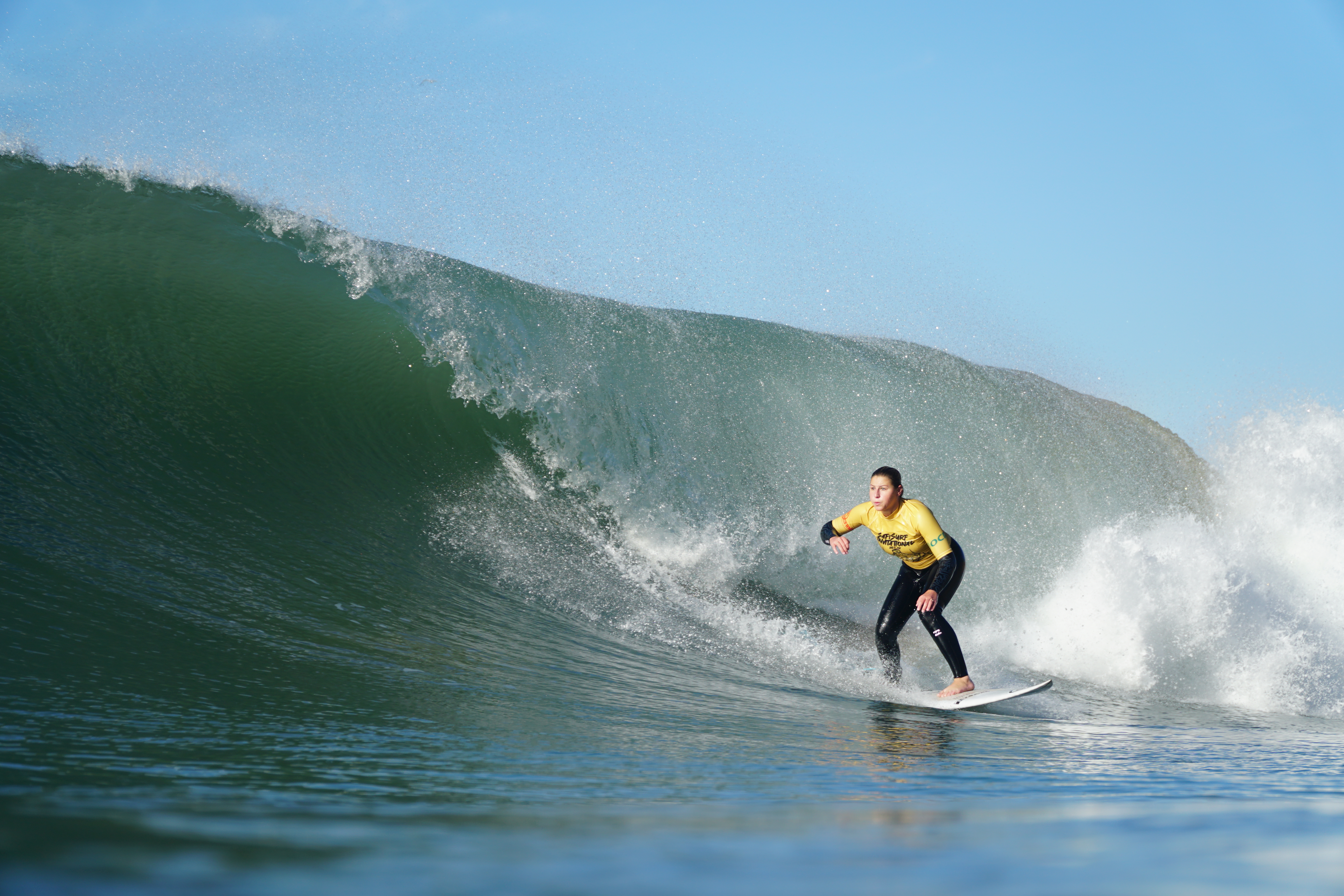 Woman surfing a clean line